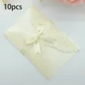 Pack of 10 elegant cream laser cut wedding invitation cards with satin ribbon bows - 10 Pieces Pack / QT-04 Beige