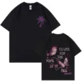 Schwarzes Baumwoll T-Shirt für Damen und Herren mit Schmetterling und Palme Grafik - S / Oberteile / Schwarz