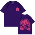 Lässiges violettes Baumwoll-Kurzarmshirt mit Blumen- und Wellen-Grafikprint hinten. - S / Oberteile / Lila