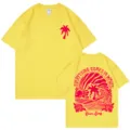 Camiseta clásica de algodón amarillo con estampados gráficos de palmeras delante y detrás. - Amarillo