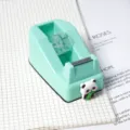 Mint green desktop tape dispenser with cute panda design, practical office and school stationery. - Mint Green