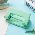 Pastel green two-hole paper puncher for loose-leaf planner office stationery and school use - Mint Green