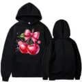 Schwarzer Langarm-Kapuzenpullover mit süßem rosa Schleife und Kirschen-Grafikdruck für Unisex. - Oberteile / Schwarz / S