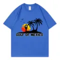 T-shirt décontracté bleu en coton à manches courtes avec imprimé coucher de soleil et palmiers. - S / Hauts / Bleu saphir