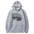 Grey fleece hoodie with football all day graphic print, casual long sleeve pullover top. - S / Gray