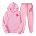 Pink fleece tracksuit set for men and women, featuring a hoodie and drawstring sweatpants. - L(XXL) / Top And Bottom / Pink
