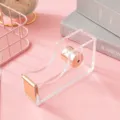 Acrylic rose gold tape dispenser, transparent desktop stationery tape cutter, medium size variant. - Gold