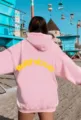Sweat à capuche oversize rose femme homme pull décontracté avec impression dos jaune - S / Rose