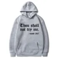 Sweat à capuche gris avec poche avant et imprimé typographique, vêtement décontracté variante. - S / Hauts / Gris clair