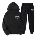Black tracksuit two-piece set featuring a hooded sweatshirt and casual sweatpants for women. - S / Top And Bottom / Black