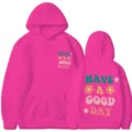 Variante de sweat à capuche rose fuchsia avec imprimé positif Have A Good Day et poche kangourou. - Rose rouge