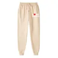 Casual thick fleece sweatpants with drawstring waist cuffed ankles and heart letter print. - S / Bottoms / Khaki
