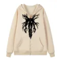 Vue détaillée du sweat à capuche zippé style gothique avec imprimé et poches pratiques. - S / Hauts / Abricot