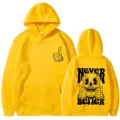 Fashion yellow hoodie with skull print, comfortable long sleeve hooded sweatshirt for men and women. - Yellow