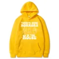 Sweat à capuche jaune avec impression de texte d'horreur drôle et coupe ample et décontractée. - S / Hauts / Jaune