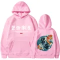 Rosa Kapuzenpullover mit Wellen Koi Fisch Print und stylischer Streetwear Typografie. - S / Oberteile / Rosa 1