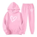 Pink women's hooded tracksuit set with cute white hand-drawn heart print for daily casual wear. - S / Top And Bottom / Pink