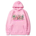 Pink hooded sweatshirt featuring a festive Christmas cup graphic and text print, casual style. - S / Tops / Pink (311)