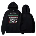 Classic black hooded sweatshirt featuring Palestine flag and slogan print. Comfortable casual wear. - S / Political Slogan Print Style (22) / Black
