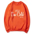 Orange crewneck sweatshirt for men and women, featuring stylish slogan print, casual streetwear. - S / Tops / Orange