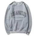 Classic grey crewneck sweatshirt featuring stylish Los Angeles California lettering print. - S / Tops / Light Gray