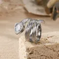 Detailed view of the multi-layer winding ring featuring a sparkling pear-cut zirconia stone. - Size 6 / Irregular Snake / Silver