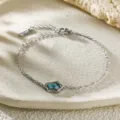 Elegant silver irregular zircon bracelet for women, perfect for daily commute and stylish jewelry. - Irregular Shape Bracelet (C419) / Silver with Blue Zirconia
