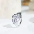 Detailed close-up of a stylish triangular cubic zirconia stainless steel ring for men and women - Size 7 / Silver