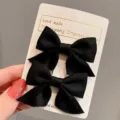 Coppia di fermagli per capelli con fiocco nero fatti a mano per bambine su carta - Un paio / Nero