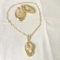 Set Di Gioielli Collana E Orecchini Ovali In Acciaio Placcato Oro 18K Di Lusso - Stile Ovale Cavo (G2) / Oro