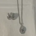 Set di gioielli color argento con collana con ciondolo a goccia e orecchini zirconati. - Forma a Goccia (2) / Argento (Stile 2)