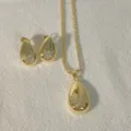 Gold plated teardrop pendant necklace and earrings set featuring micro-inlaid cubic zirconia. - Butterfly (G Butterfly)