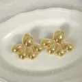 Orecchini a lobo goccia metallo oro design statement donna per festa elegante - Stile Petalo Goccia d'Acqua