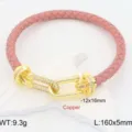 Pink leather rope bracelet with gold U-lock cubic zirconia charm, stylish jewelry. - Pink