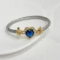 Bracciale rigido intrecciato retrò di lusso placcato oro 18K con zircone cuore blu - Blu