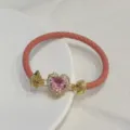 Pink braided leather bracelet with gold-plated heart zircon clasp fashion jewelry detail - Pink