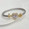 Bracciale rigido a cavo ritorto con cuore in zircone placcato oro 18k variante donna. - Bianco
