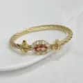 Luxury 18K gold plated twisted cable bracelet with elegant oval zircon crystal for women. - Gold Champagne
