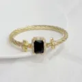 Gold twisted wire cuff bracelet with square black gemstone and sparkling micro pavé zirconia. - Gold Black