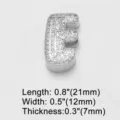 Detail shot of silver letter E charm pendant with sparkling cubic zirconia pavé setting. - Letter E (brc72) / Silver