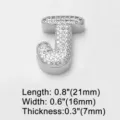 Close-up of a silver letter J charm paved with sparkling cubic zirconia stones for DIY jewelry. - Letter J (brc72) / Silver