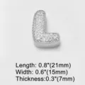 Detail view of silver letter L charm pendant with sparkling cubic zirconia stones, close-up. - Letter L (brc72) / 18K Gold / Silver