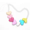 Detail shot of a cute colorful heart phone charm with faux pearl beads and lovely design. - High-end Style / Random Color