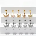 Detailed view of crystal butterfly belly button rings, stainless steel navel piercing. - Style 1 / Silver