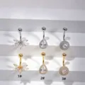 Detailed shot of stainless steel navel rings featuring zirconia stones in gold and silver. - Flower Butterfly Style (1#) / Silver