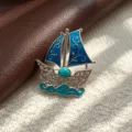 Vintage blue enamel sailboat brooch with turquoise accent, retro ocean style suit pin accessory. - Double Sail
