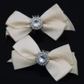 Elegant cream satin bow shoe clips with sparkling sunburst rhinestones for bridal shoes. - 一双装(S0079) / Off White