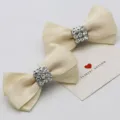 Elegant beige satin bow shoe clips with square rhinestone centers for bridal shoes - Single Pack (S0081) / Off White