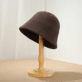 Detailed view of the brown wool bucket hat showing soft texture, cozy warmth, and classic style. - M (56-58cm) / Coffee
