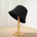 Detailed view of the classic black wool bucket hat, perfect for autumn and winter warmth. - M (56-58cm) / Black